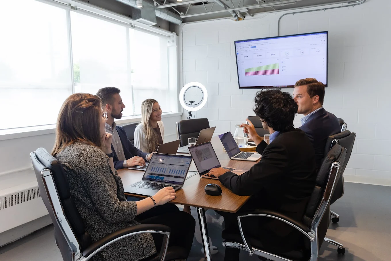 Consultus Digital team meeting around the boardroom table